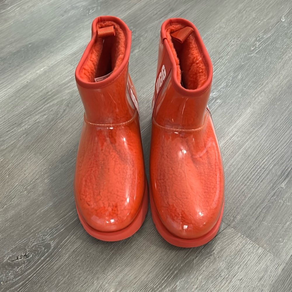 Orange Mini UGG boots. Rain style.